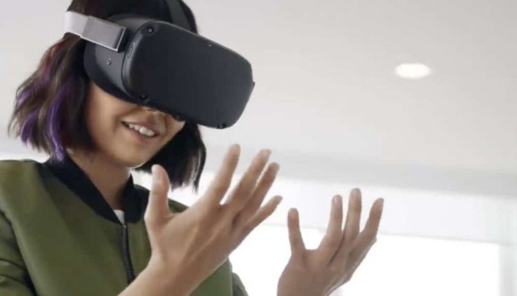 Woman using the Oculus Quest VR headset with hand tracking